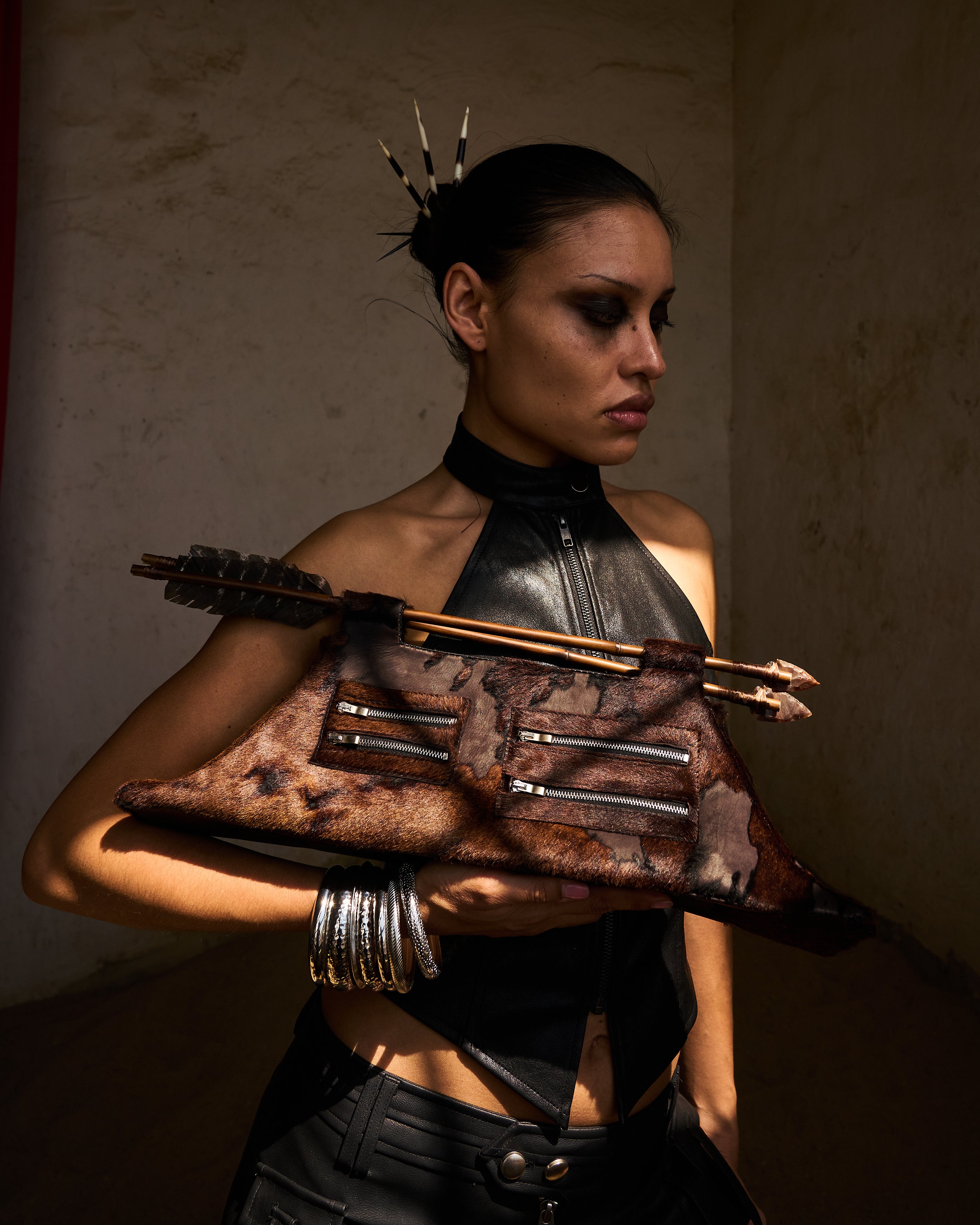 THE ARROW CLUTCH